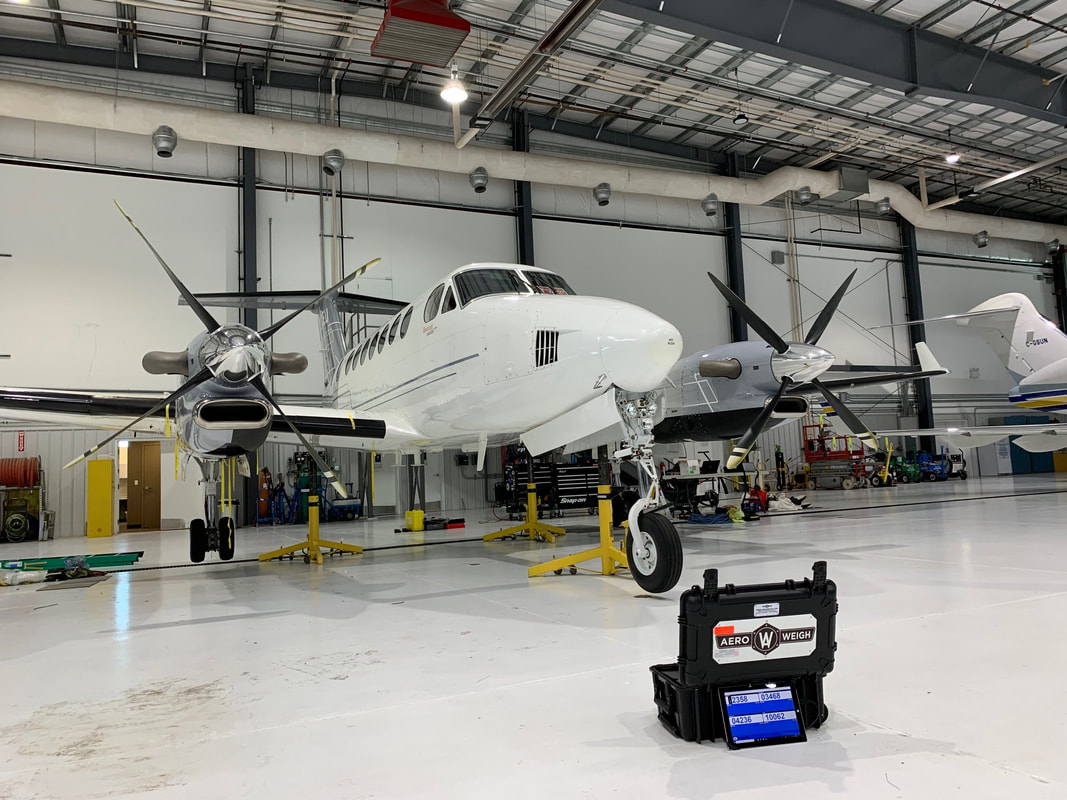 Beechcraft scales, beechcraft weighing equipment, aircraft weighing, Beechcraft weight and balance, Aeroweigh aircraft weighing equipment, aircraft scales rental, Beechcraft maintenance, aviation weighing solutions, portable aircraft scales, certified aircraft weighing, precise aircraft weight measurement, Beechcraft King Air weighing, Beechcraft Baron weighing, Beechcraft Bonanza scales, aircraft weighing services, rent aviation scales, AIO All In One scales, flight safety, aircraft compliance, temporary weighing equipment, professional aircraft weighing